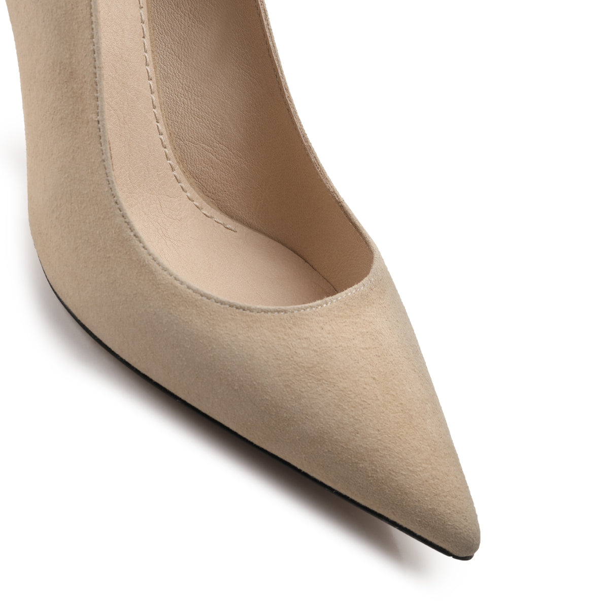 Beige suede pumps