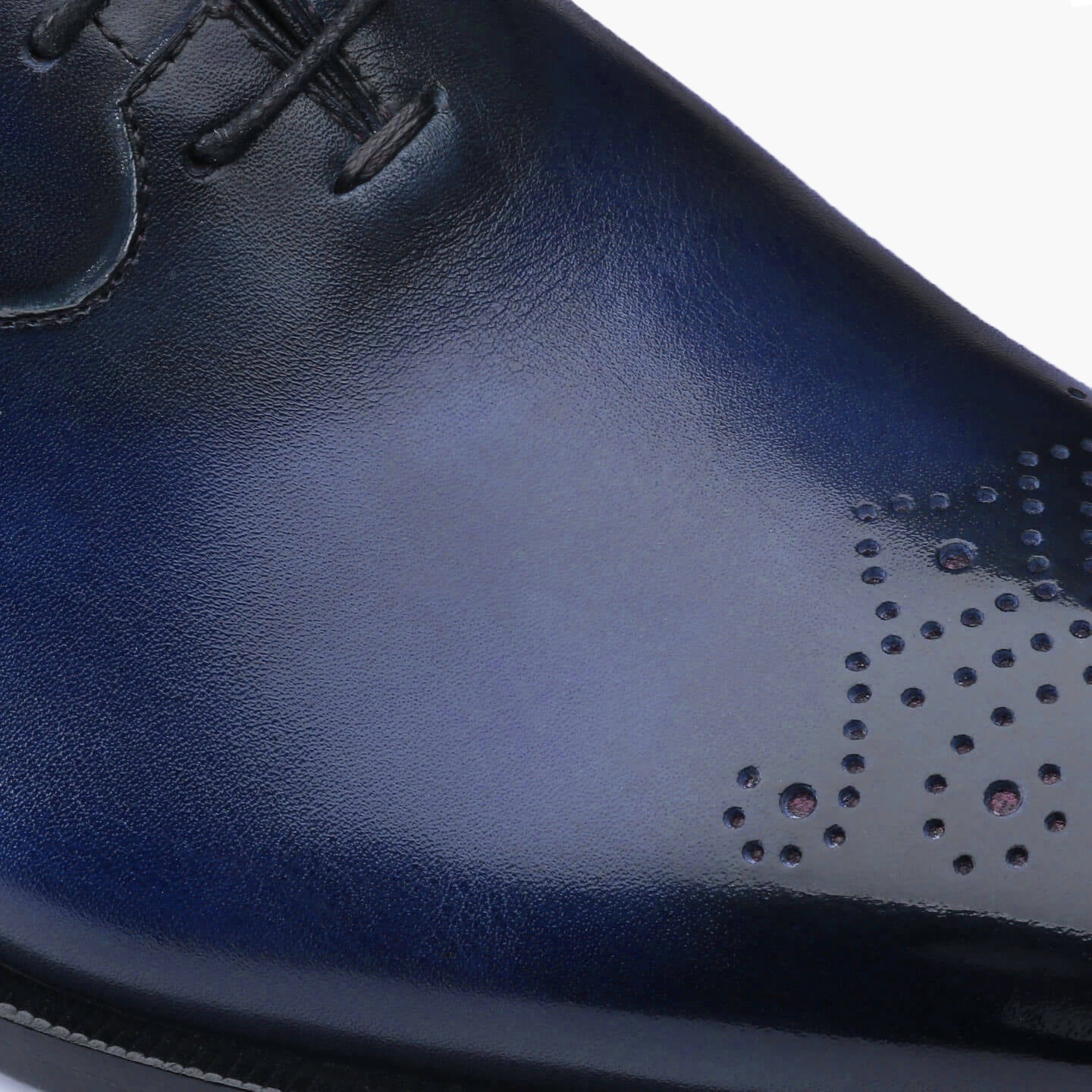 Perforated oxford shoes